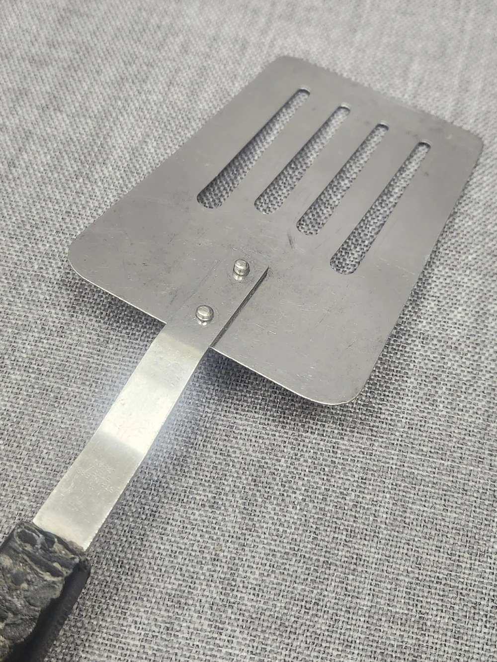 Vintage Stainless Steel Slotted Spatula Black Handle Made In Japan.